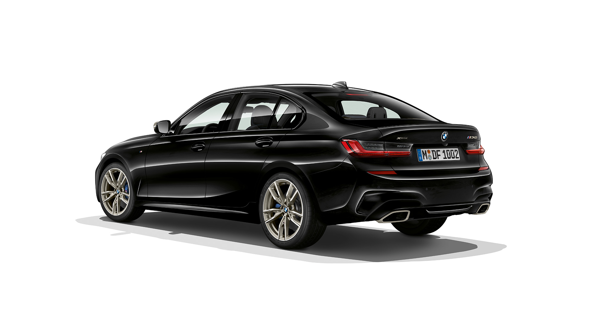 BMW Série 3 Berline, poupe M340i xDrive. Vue de trois-quarts arrière de la BMW Série 3 M340i xDrive Berline.