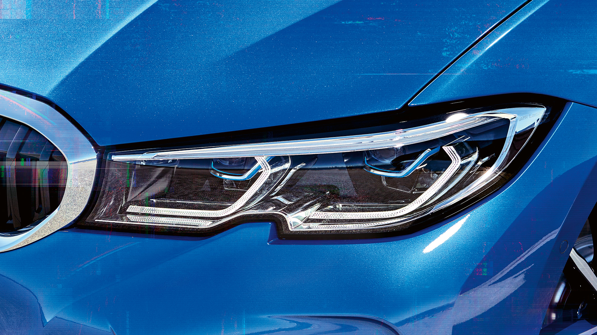 BMW Série 3 Berline, BMW Laser G20. Gros plan latéral du phare avant droit avec BMW Laser G20.