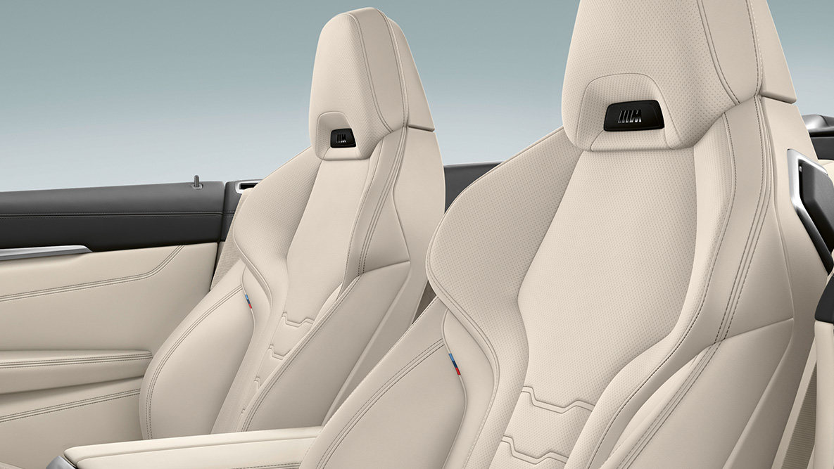 BMW M850i xDrive, sièges multifonctions en cuir Merino Elfenbeinweiß avec chauffe-nuque. BMW M850i xDrive, sièges multifonctions en cuir Merino Elfenbeinweiß avec chauffe-nuque.