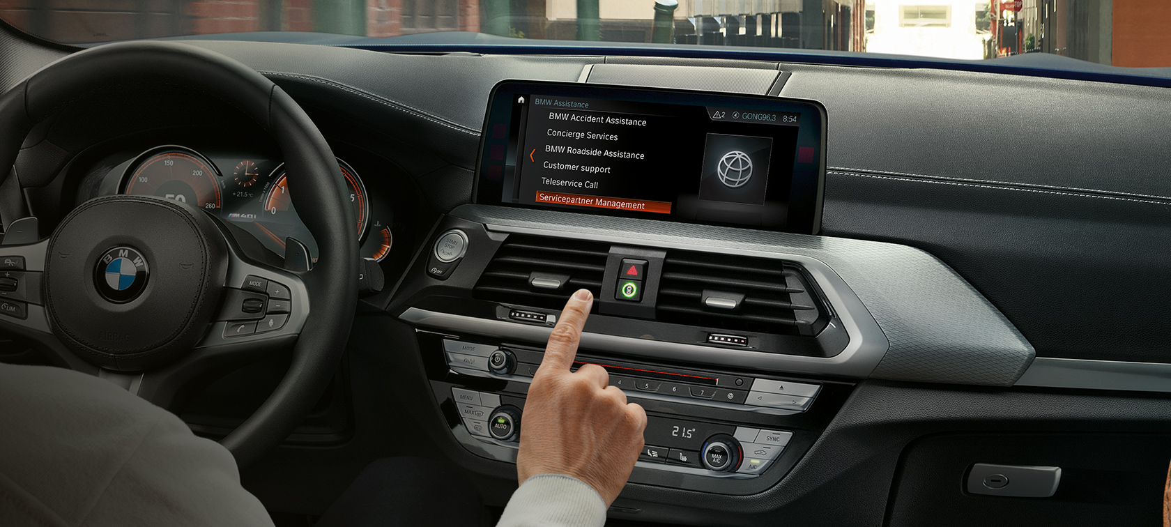 Prise de vue de l'habitacle dans une BMW avec Control Display Prise de vue de l'habitacle dans une BMW avec l'appel affiché sur le Control Display.