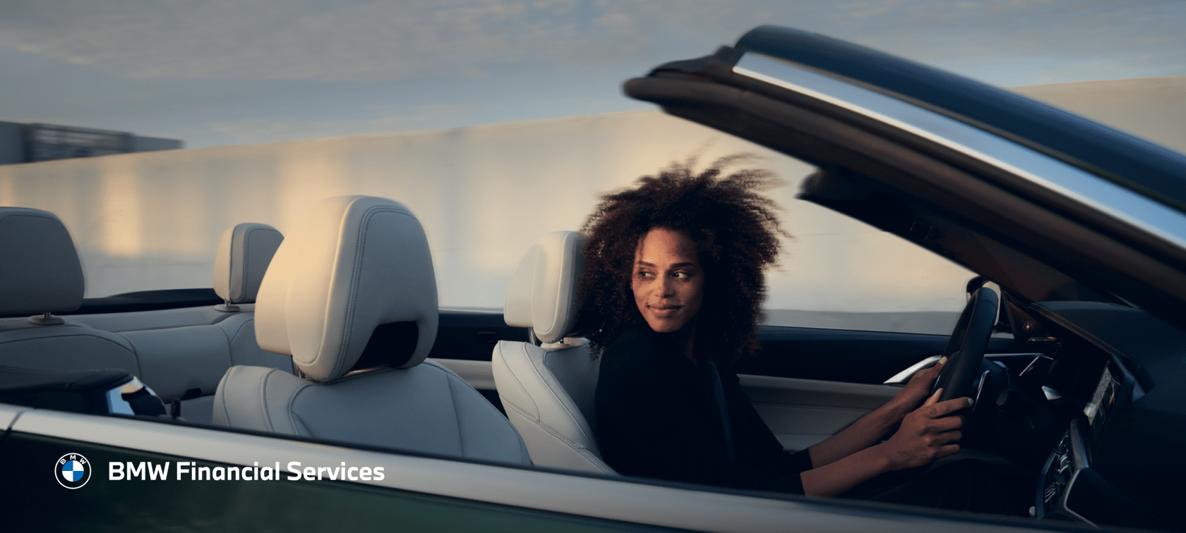Femme au volant d'une BMW Femme au volant d'une BMW
